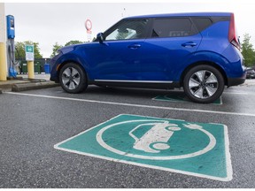 An electric 2020 Kia Soul EV leaves an EV station at Hillcrest Aquatic centre in 2019.
