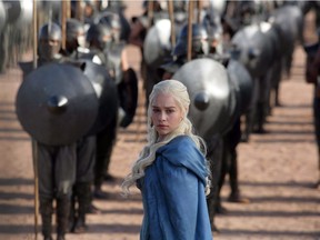 This file publicity image released by HBO shows Emilia Clarke as Daenerys Targaryen in a scene from "Game of Thrones."