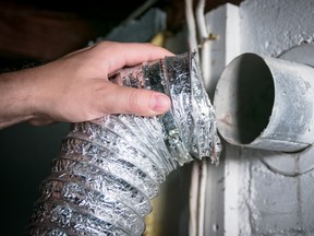 Flexible aluminum dryer vent hose, removed for cleaning/repair/maintenance