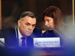 House Speaker Darryl Plecas speaks with Kate Ryan-Lloyd acting clerk of the house during a Legislative Assembly Management Committee meeting in the Douglas Fir room at Legislature in Victoria, B.C., on Monday, January 21, 2019.