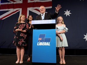 Prime Minister of Australia and leader of the Liberal Party Scott Morrison, flanked by his wife Jenny Morrison and daughters Lily Morrison and Abbey Morrison, delivers his victory speech at the Sofitel Sydney Wentworth on May 18, 2019 in Sydney, Australia.