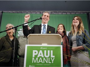 Green Party's Paul Manly celebrates with his family from (left to right), his mother Eva and father Jim, wife Samantha and daughter Aven after results come in for the Nanaimo-Ladysmith byelection at the Cavallotti Lodge in Nanaimo, B.C., on Monday, May 6, 2019.