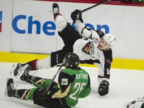 Vancouver Giants' Tristen Nielsen and Prince Albert Raiders' Sean Montgomery collide during the first period of play during game 3 of the WHL Championship series playoffs at the Langley Events Centre in Langley, BC Tuesday, May 7, 2019.
