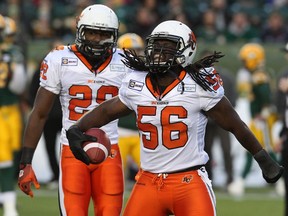 Solomon Elimimian of the B.C. Lions, right, was surprised when the CFL team released him this week and deferred all questions about the reasons to GM Ed Hervey. The veteran hopes to find a new team to play for in the coming season, insisting his body is healed and ready to compete.