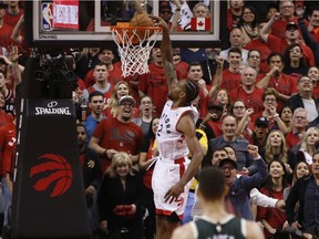 Toronto Raptors Kawhi Leonard SF (2) jams the ball during second OT  in Toronto, Ont. on Sunday May 19, 2019.