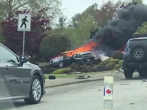 A fiery collision at the Peace Arch crossing has closed Highway 99.