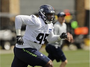 Seattle Seahawks defensive end L.J. Collier runs a drill during NFL football rookie minicamp on Friday in Renton, Wash.
