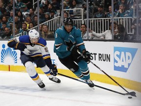 St. Louis Blues' Colton Parayko (55) battles for the puck against San Jose Sharks' Evander Kane (9) in the first period in Game 5 of the NHL hockey Stanley Cup Western Conference finals in San Jose, Calif., on Sunday, May 19, 2019.