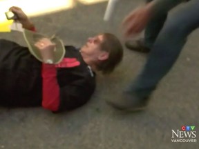 CTV news captured protester Susan Stout, 74, being shoved to the ground by members of the Vancouver Police Department and the Prime Minister's security detail.