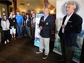 Randy Diamond, the Swiftsure chair, (second from right) addresses some of the racers and guests at Spinakers Brew pub, May 14, 2019.