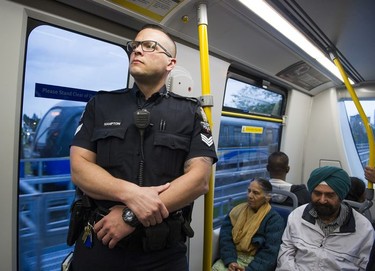 Transit Police Sgt. Clint Hampton rides a train between Gateway and Surrey Central SkyTrain stations.