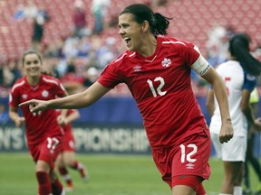 FILE - In this Oct. 14, 2018, file photo, Canada forward Christine Sinclair celebrates after scoring a goal in the second half of a soccer match at the CONCACAF women's World Cup qualifying tournament against Panama in Frisco, Texas.