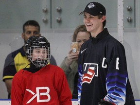 Top draft prospect Jack Hughes takes part in a clinic at Hillcrest Community Centre in Vancouver on Thursday, a day ahead of the NHL Entry Draft at Rogers Arena.