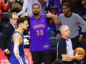 Drake reacts during Game One of the 2019 NBA Finals between the Golden State Warriors and the Toronto Raptors at Scotiabank Arena on May 30, 2019 in Toronto, Canada.