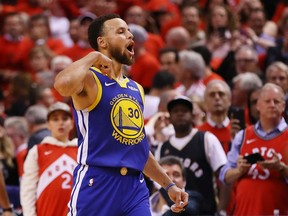 TORONTO, ONTARIO - JUNE 10:  Stephen Curry #30 of the Golden State Warriors reacts against the Toronto Raptors in the second half during Game Five of the 2019 NBA Finals at Scotiabank Arena on June 10, 2019 in Toronto, Canada. NOTE TO USER: User expressly acknowledges and agrees that, by downloading and or using this photograph, User is consenting to the terms and conditions of the Getty Images License Agreement.