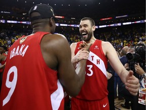 Serge Ibaka and Marc Gasol of the Toronto Raptors celebrate their team's 114-110 victory over the Golden State Warriors on Thursday at Oracle Arena in Oakland, Calif. The Raptors won the best-of-seven NBA Finals series in six games.