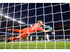 Hedvig Lindahl of Sweden saves a penalty from Janine Beckie of Canada during the 2019 FIFA Women's World Cup France Round Of 16 match between Sweden and Canada at Parc des Princes on June 24, 2019 in Paris, France.