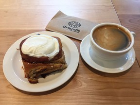 A cinnamon bun and Café Americano from Grounds for Coffee.