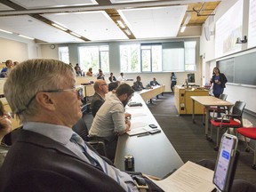 Panel judge Sam Sullivan, the MLA for Vancouver-False Creek, listens to a presentation during the Three-Minute Thesis Competition at the 2019 edition of the Congress of the Humanities and Social Sciences.