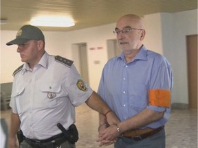 Thompson Rivers University professor David Scheffel is led away from court in handcuffs after being sentenced in Presov, Slovakia, to seven years in prison. Scheffel was found guilty on charges of sexual abuse and illegal weapon possession. The 64-year-old maintains his innocence and suspects the accusations may have been fabricated by police in an attempt to discredit him and his research into the marginalized Romani people of the Eastern European country.