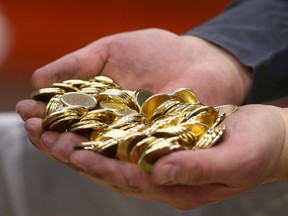 Loonie blanks at the Canadian mint. There's some consensus about where our dollar will be in a few months, but the longer outlook isn't as shiny.