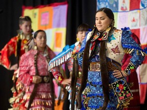 Jingle Dancers perform at the closing ceremony marking the conclusion of the National Inquiry into Missing and Murdered Indigenous Women and Girls at the Museum of History in Gatineau, Quebec on June 3, 2019.