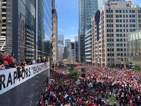 Fans jam University Avenue in downtown Toronto for the 2018-19 NBA champion Raptors' parade on Monday, June 17.