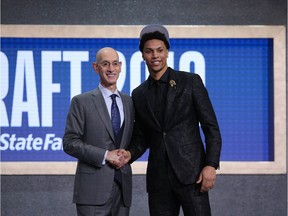 Jun 20, 2019; Brooklyn, NY, USA; Brandon Clarke (Gonzaga) greets NBA commissioner Adam Silver after being selected as the number twenty-one overall pick to the Oklahoma City Thunder in the first round of the 2019 NBA Draft at Barclays Center. Mandatory Credit: Brad Penner-USA TODAY Sports