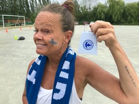 Hannele Jantti really got into the Finland spirit of the 14th annual Paavo Nurmi Run on Saturday morning at Burnaby Lake Park. She also clocked a sub 56-minute 10K time.