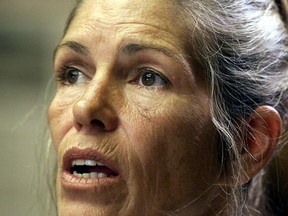Leslie Van Houten listens during her parole hearing in Corona, California, June 28, 2002. Los Angeles' top prosecutor on June 28, 2016, urged California Governor Jerry Brown to keep former Charles Manson follower Van Houten behind bars, despite the recommendation of a parole board that she be released.