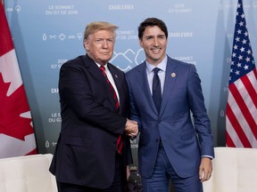 Canada's Prime Minister Justin Trudeau meets with U.S. President Donald Trump at the G7 leaders summit in La Malbaie, Que., on Friday, June 8, 2018. Prime Minister Justin Trudeau is headed to Washington next Thursday to meet U.S. President Donald Trump.