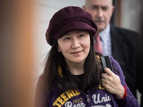 Huawei chief financial officer Meng Wanzhou, who is out on bail and remains under partial house arrest after she was detained Dec. 1 at the behest of American authorities, arrives back at her home after a court appearance in Vancouver, on Wednesday March 6, 2019. Lawyers for the RCMP and Canadian Border Services Agency are denying allegations that their officers searched Huawei executive Meng Wanzhou's phones and electronic devices after a border official wrote down her passwords.