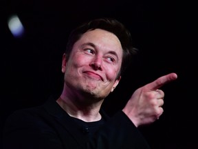 Tesla CEO Elon Musk speaks during the unveiling of the new Tesla Model Y in Hawthorne, California on March 14, 2019. Musk says intelligent machines will replace human workers.