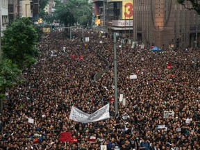Large numbers of protesters rallied in Hong Kong on Sunday despite an announcement yesterday by Hong Kong's Chief Executive Carrie Lam that the controversial extradition bill will be suspended indefinitely.