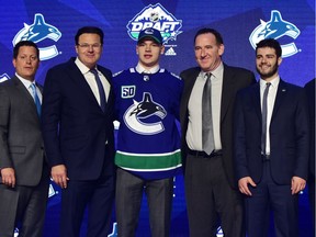 Vasili Podkolzin poses for a photo after being selected as the number 10 overall pick to the Vancouver Canucks in the first round of the 2019 NHL Draft at Rogers Arena. Mandatory Credit: Anne-Marie Sorvin-USA TODAY Sports