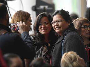 A woman poses for a photo with Independent Member of Parliament Jody Wilson-Raybould following ceremonies marking the release of the Missing and Murdered Indigenous Women report in Gatineau, Monday June 3, 2019.