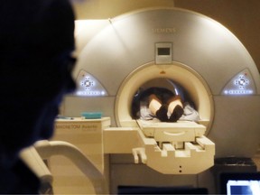 A patient gets an MRI test.