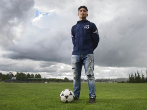 Eh Hser Moo, a midfielder with Langley Secondary School, arrived in the Lower Mainland as an eight-year-old with his family from a Karen refugee camp. He packed studies into summers and took extra classes so he could graduate a year early and accept soccer scholarship to Trinity Western University. Photo: Jason Payne/Postmedia