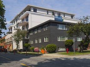 A motion before council would extend protections for rental housing to streets such as East Boulevard where new, larger buildings, often of condominiums, are replacing low-rise apartment buildings, such as the one in the foreground.