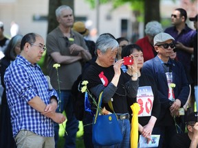 Participants at the annual ceremony commemorating the anniversary of the Tiananmen Square massacre, at the University of British Columbia. Photo: Nick Procaylo/PostMedia