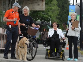 Bruce Gilmour, Ann Pacey, Doris Hunter and Elizabeth Roy (left to right) during their recent ‘street audit’ of sidewalk safety along 41st Avenue in Dunbar that evaluated the area based on its walkability and wheelability.