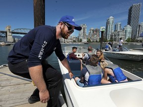 Stephen Gale gives a safety briefing to customers at Granville Island Boat Rental in Vancouver. Photo: Nick Procaylo/Postmedia