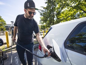 VANCOUVER, BC, Micheal Stanyer, owner of electric vehicle.......(Photo credit: Francis Georgian / Postmedia) .June 13 2019. , Vancouver, June 13 2019. Reporter: ,  ( Francis Georgian   /  PNG staff photo)  ( Prov / Sun News ) 00057776A [PNG Merlin Archive]