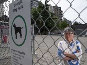 Ellen Woodsworth poses at the dog park at 1608 West Georgia St. in Vancouver on June 17. Woodsworth opposes a property-tax break for developers who keep community gardens on lots intended for development.