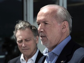 Premier John Horgan, right, and B.C. Minister of Environment and Climate Change Strategy George Heyman, left.