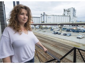 Kate MacDonald is concerned about the demolition of several old grain silos across the tracks from her art studio.