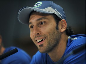 Roberto Luongo talks to the media at a press conference  in Vancouver on September 11, 2013.