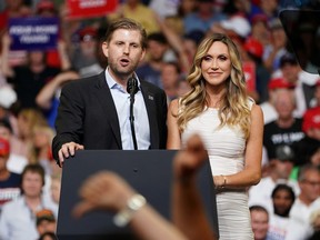 Eric Trump and Lara Trump speak before a U.S. President Donald Trump campaign kick off rally at the Amway Center in Orlando, Florida, U.S., June 18, 2019.