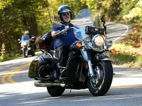 John Jefferson on his motorcycle before an accident in which he collided with a buck that jumped in front of him on the highway, seriously damaging his ankle.