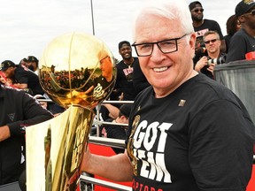 Director of Sports Science Alex McKechnie of the Toronto Raptors holds the Larry O'Brien trophy